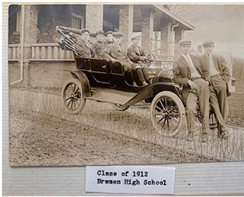 Ford that was painted from a photograph that Bill had taken of Ford. old photo of ford truck, men standing and sitting in vehicle